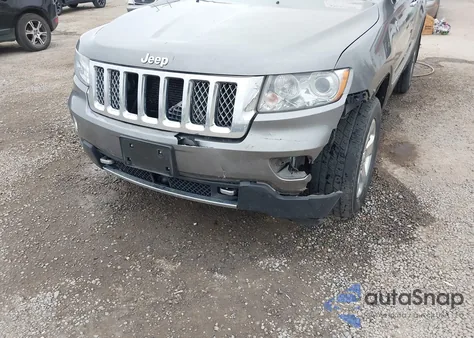 2012 Jeep Grand Cherokee Overland z USA, uszkodzony, nr VIN 1C4RJFCTXCC280817